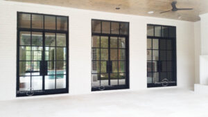 three sets of back double doors with transom units above